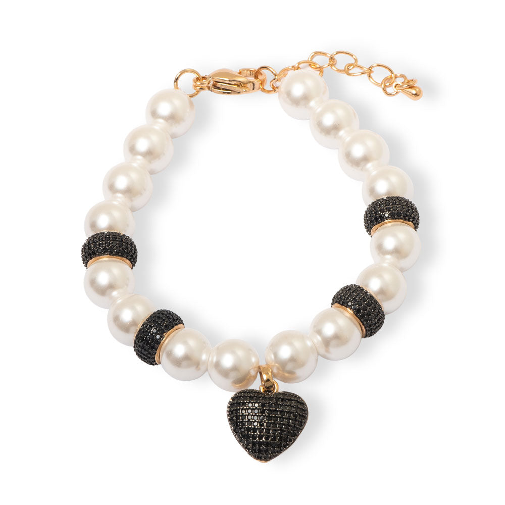 Pulseira em fios torcidos com banho de ouro 18k, textura tridimensional polida e fosca.